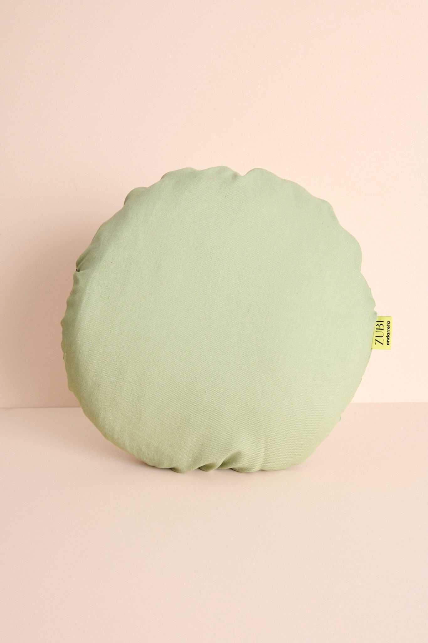 cojin verde de ZUBI