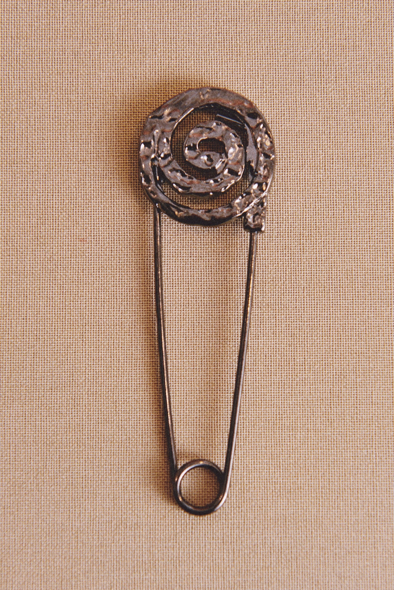 Broche caracola plateado